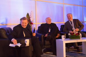 Msgr. Kieran Harrington, Bishop DiMarzio and Tablet news director Ed Wilkinson enjoy a jovial moment during the live taping of “In The Arena.”