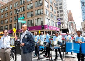 Brooklyn Borough President Eric Adams kicks off his 2015 School Lunchtime Concert Series, held in collaboration with the Downtown Brooklyn Partnership and sponsored by Investors Bank, with a performance in Willoughby Plaza by the steel orchestra at M.S. 354 The School of Integrated Learning in Crown Heights. He is standing next to Luis Gutierrez, production and marketing manager for the Downtown Brooklyn Partnership. Photos: Kathryn Kirk/Brooklyn BP’s Office