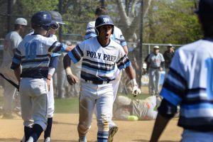 Travis Zurita celebrates after hitting an inside-the-park-homer that put Poly Prep up over George Washington 4-0 in the second inning. Eagle photos by Rob Abruzzese