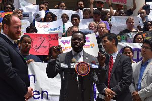 Councilmember Mathieu Eugene, center, at a City Hall rally to restore funding for summer programs. Far left: Councilmember David Greenfield. Far right: Councilmember Carlos Menchaca. Photo by Vanessa Ogle/Mathieu Eugene’s Office