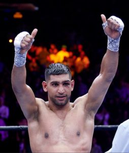 Amir “King” Khan may have punched his ticket to a showdown with Floyd Mayweather later this year after scoring a unanimous decision victory over Chris Algieri at the Barclays Center last Friday night. AP photo
