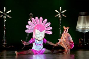 A humanoid Brazilian Carnival-bot (Yacnoy Abreu Alfonso) dances with a Carnival reveler (Aliashka Hilsum). Photos by Laurent Philippe