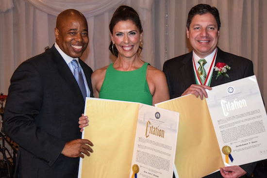 Borough President Eric Adams (left) presents citations to the Columbian Lawyers incoming President Rose Ann C. Branda and outgoing President Bart Russo during the association’s 47th annual dinner dance on Friday. Eagle photo by Rob Abruzzese