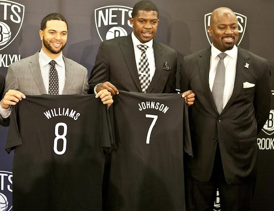 Nets general manager Billy King (right) will have his hands full trying to deal off either Deron Williams (left) or Joe Johnson this summer.  Eagle photo by Mary Frost