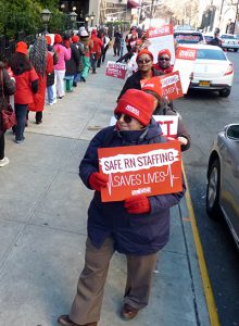 Brooklyn hospitals say they will put contingency plans in place if nurses decide to go on strike. Shown: Nurses at New York Methodist Hospital in Park Slope rallied in December. The hospital says it has hired 125 registered nurses since the beginning of last year.  Photo by Mary Frost