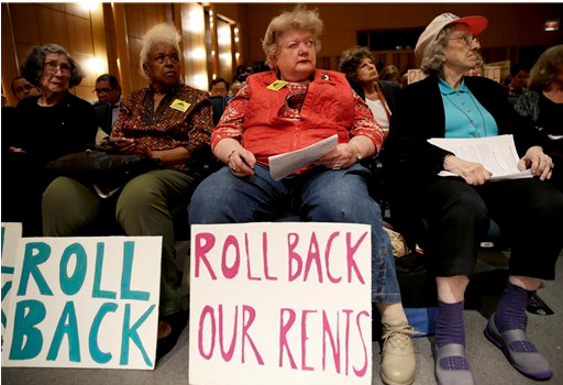 Senior citizens attend a public meeting of the Rent Guidelines Board on June 8. AP Photo/Seth Wenig