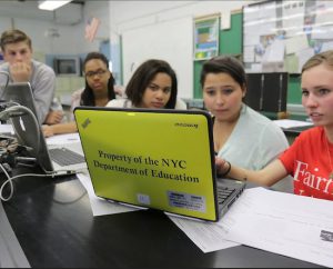 Students work with a computer in a science classroom at Michael J. Petrides School in Staten Island. The American Federation of Teachers and its New York City chapter announced a $500,000 initiative Thursday to fund career and technical education in New York and four other cities. Anthony DePrimo/The Staten Island Advance via AP, Pool