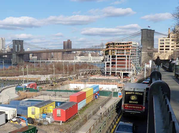 State Supreme Court Justice Lawrence Knipel ruled on Friday that construction can proceed on the disputed Pierhouse hotel and condominium complex in Brooklyn Bridge Park, seen in the background in the photo above. Photo by Mary Frost