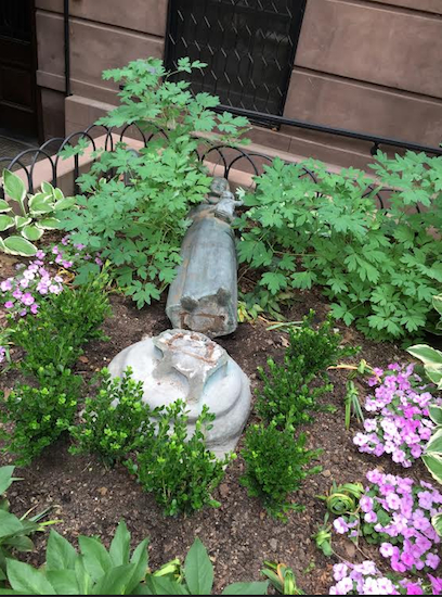 The statue of the Blessed Virgin Mary vandalized in front of the Parish Center/Rectory at 31 Sidney Place. Photo courtesy of St. Charles Borromeo Church