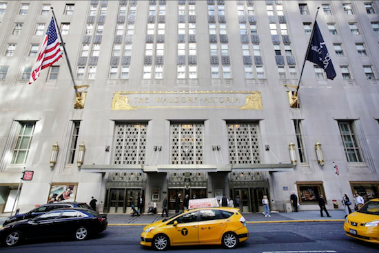 A police source said a wedding guest’s gun went off accidentally at New York’s Waldorf Astoria Hotel (shown above) on Saturday, June 13, and a few people suffered minor injuries from debris.  AP Photo/Mark Lennihan, File