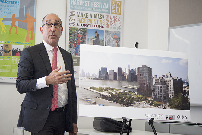 David J. Wine, managing partner of Oliver's Realty Group, describes the proposal at a press conference on Tuesday at Brooklyn Bridge Park. Eagle photo by Cody Brooks