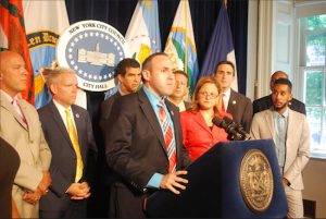Councilmember Mark Treyger (at podium) says it’s vital that the city’s communications infrastructure be working in an emergency. At right, next to Treyger, is Council Speaker Melissa Mark-Viverito. Photo courtesy of Councilmember Treyger’s Office