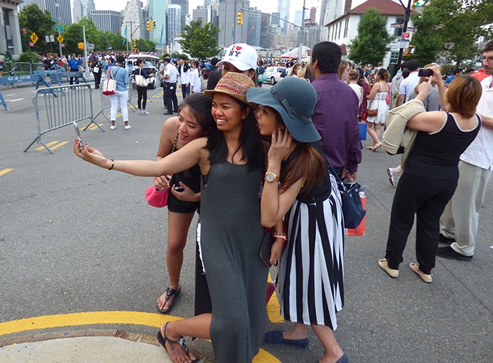 Taking selfies on Old Fulton Street. Photo by Mary Frost