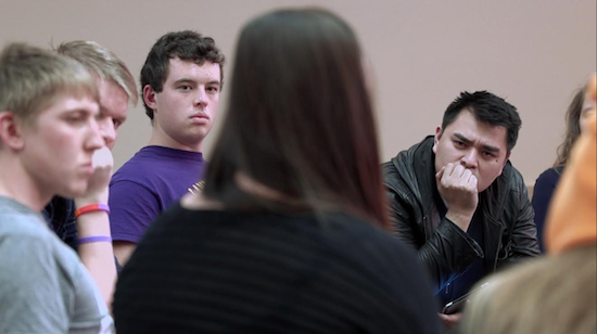 In this image released by MTV, filmmaker Jose Antonio Vargas, right, listens to a group of young people during the filming of his documentary "White People." The full film debuts Wednesday, July 22, at 8 p.m. ET/PT, offered simultaneously online. MTV via AP