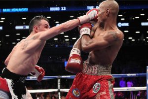 Brooklyn’s Paulie Malignaggi (left, seen fighting Zab Judah) is looking to stun unbeaten Danny Garcia at the Barclays Center on Saturday night in what may be his swan song in the ring. Photo courtesy of HoganPhotos/SHOWTIME