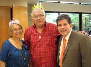 Councilmember Vincent Gentile (right) congratulates Alfonso and Sylvia Valentin, the king and queen of the prom. Photo courtesy NYU Lutheran