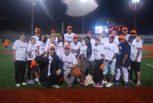 Councilmember Mark Treyger (kneeling at left) and the game’s participants raised $1,300 for the Coney Island Autism Angels. Photo courtesy Treyger’s office