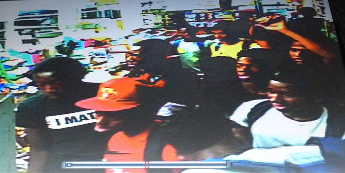 Roughly 20 young men rampaged along Joralemon Street in Brooklyn Heights last Thursday night at 7 p.m., allegedly stealing money from street vendors and terrorizing a popular local deli. Shown: Surveillance video from the deli shows the crowd inside the store. (Not all of the men pictured ripped off the store. One of the men paid for his Arizona tea.) Four were later arrested as they played basketball at Brooklyn Bridge Park. Video stills courtesy of the Sunny Gourmet Deli