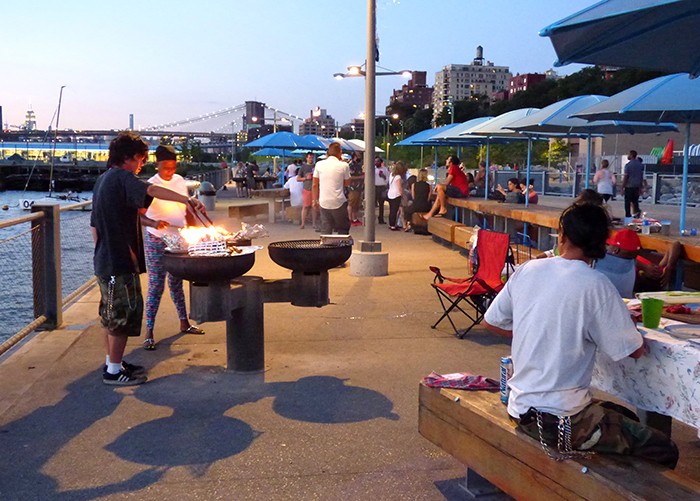 Park-goers enjoy Pier 5’s Picnic Peninsula, the park’s BBQ headquarters.