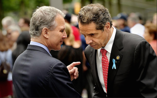 Gov. Andrew Cuomo (r.) and state Attorney General Eric Schneiderman said on Monday that New York's new system of investigating cases in which unarmed civilians are killed by police should serve as an example as other states look to shore up confidence in law enforcement. AP Photo/Justin Lane, Pool