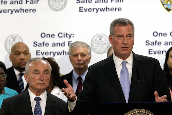 Mayor Bill de Blasio, right, is joined by Police Commissioner William J. Bratton as he speaks to reporters during a news conference to discuss the Summer All Out community policing program on July 15 in the Bronx. De Blasio is having a bad summer, unable to shake a media-driven perception that the Big Apple's crime-and-vagrant-filled days are returning. AP Photo/Mary Altaffer