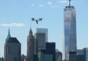 Office workers and Brooklyn Heights residents were shocked on Thursday when they looked out of their high-rise windows and saw this drone peering in at them. Cops hunted down the drone operator and nabbed him on Friday. Photos by Mary Frost