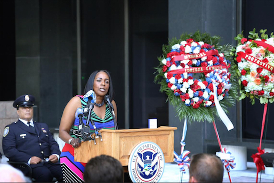 Idrissa Camara's colleague Carolyn Harley, who worked with Camara at a federal office building, speaks at a memorial service for the slain guard ob Aug. 27, outside the building where the shooting took place. Camara was killed on Aug. 21 when a gunman shot the senior guard at close range before killing himself. AP Photo/Mike Balsamo