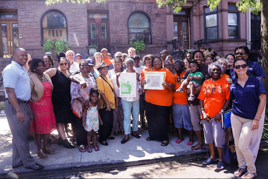 The Greenest Block in Brooklyn 2015 winners from Bainbridge Street in Bedford-Stuyvesant are pictured with Brooklyn Borough President Eric Adams (far left). Photo by Malcolm McDaniel, courtesy of the Office of the Brooklyn Borough President