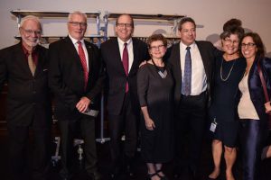 From left: Hockey analyst Stan Fischler; Bill Dutton, nephew of Red Dutton and co-owner of the Phoenix Coyotes; Co-Owner of the Islanders Jon Ledecky; Brooklyn Historical Society President Deborah Schwartz; Steven M. Cohen; Brooklyn Historical Society VP Marcia Ely; and Lisa Cohen. Steven and Lisa Cohen encouraged the BHS to organize the event. Eagle photos by Rob Abruzzese