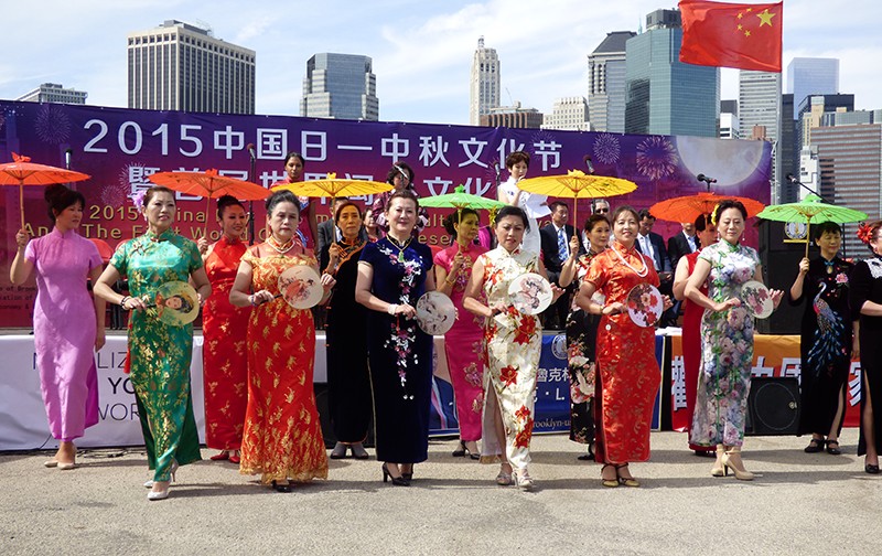Members of the New York Chinese Qipao Association showcase beautiful dresses and graceful moves.