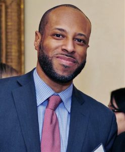 In this photo taken in 2011, and provided by the New York Governor’s Office, Carey Gabay, first deputy general counsel at the Empire State Development Corporation is shown. Gabay, an aide to Gov. Andrew Cuomo, was fighting for his life Tuesday, a day after being caught in the crossfire between two gangs in Brooklyn. Gabay was shot in the head during a pre-dawn party Monday, celebrating the West Indian Day parade. Judy Sanders/New York Governor’s Office via AP