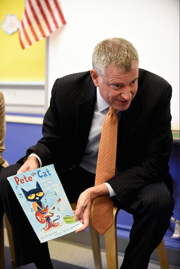 New York City Mayor Bill de Blasio reads a book to pre-K students on their first day of school at P.S. 59 in Staten Island. A new poll shows New York state voters do not want Mayor Bill de Blasio to keep control of New York City public schools. Barry Williams/New York Daily News via AP, Pool