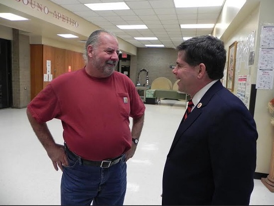 Councilmember Vincent Gentile (right) chats with Community Board 10 Treasurer Greg Ahl. Eagle photo by Paula Katinas