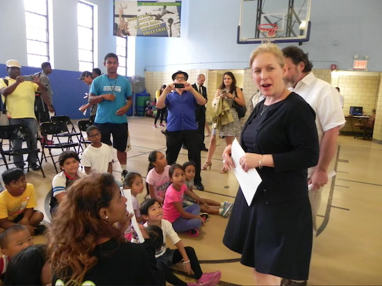 U.S. Senator Kirsten Gillibrand, pictured at a Sunset Park event during the summer, says the new federal funding will help community groups that help immigrants to expand their services. Eagle photo by Paula Katinas