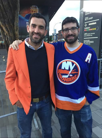 John Bourne (left) and Jake Berlin show off their Islander colors in advance of Monday night’s preseason opener at the Barclays Center, where Brooklyn’s new NHL franchise will officially kick off its inaugural season here on Oct. 9. Eagle photos by John Torenli