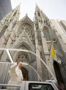 Pope Francis waves to New Yorkers outside St. Patrick's Cathedral during his recent visit to New York City. Please, dear Pontiff — come back soon to NYC, and include Brooklyn in your itinerary. L'Osservatore Romano/Pool Photo via AP