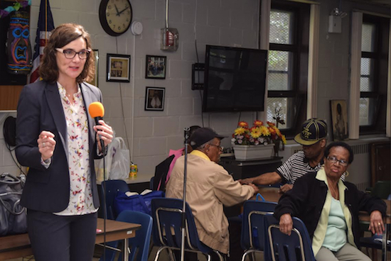 Attorney Robin Goeman works with the Brooklyn Volunteer Lawyers Project and assists seniors as part of the NGF Senior LEAP program. Here, she is seen talking with seniors from the Vandalia Senior Center in East New York. Eagle photo by Rob Abruzzese