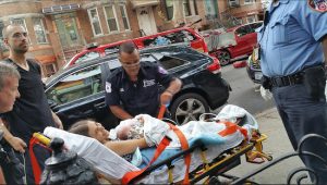 The ambulance crew takes Rebecca Giordano and baby Isaiah to the hospital. Photo courtesy of Renee Giordano