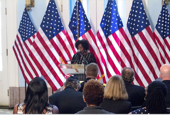 Trudi Aiken, aunt of Sept. 11 victim Terrance Andre Aiken, reads her poem, “Reflections,” at the Borough Hall 9/11 Remembrance Service. Brooklyn Eagle Photo by Francesca N. Tate