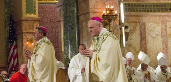 Auxiliary Bishops Witold Mroziewski and James Massa (in foreground), are presented immediately following their July 20 consecration liturgy at the Co-Cathedral of St. Joseph. Brooklyn Eagle Photo by Francesca N. Tate