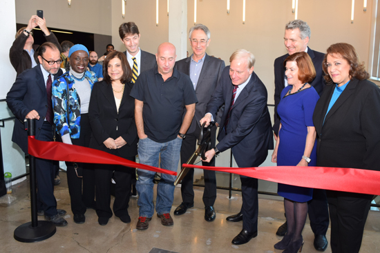 Officials from Brooklyn College, Steiner Studios and CUNY were on hand for the official ribbon-cutting ceremony to mark the opening of the Feirstein Graduate School of Cinema. From left: Fisher Stevens, Councilmember Inez Barron, Rhoda Glickman, David Ehrenberg, Doug Steiner, Jonathan Wacks, Barry R. Feirstein, CUNY Chancellor James B. Milliken, Brooklyn College President Karen L. Gould, and Cynthia Lopez.
