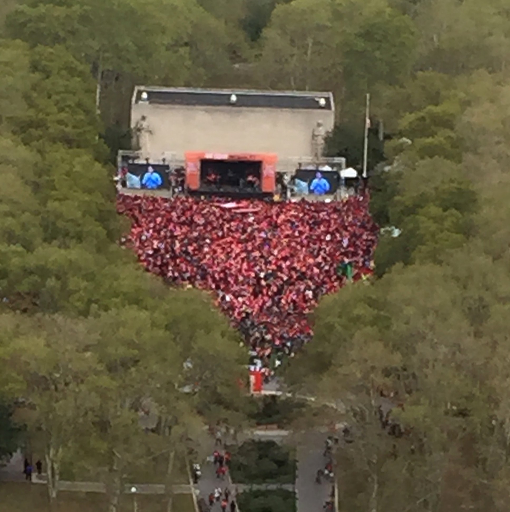 An aerial view of the rally, showing the crowd as a sea of red. Photo by Shlomo Sprung