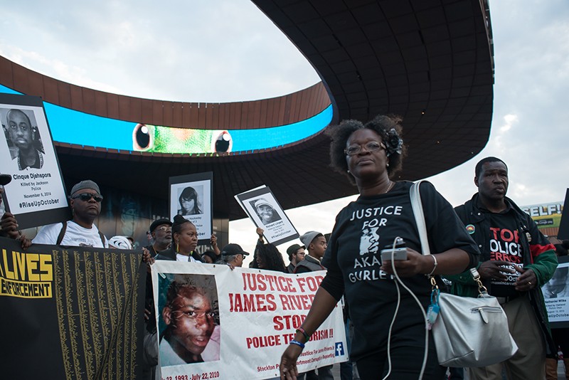 Following the rally in Downtown Brooklyn, protesters marched to Barclays Center for a second rally. Photo by Albin Lohr Jones