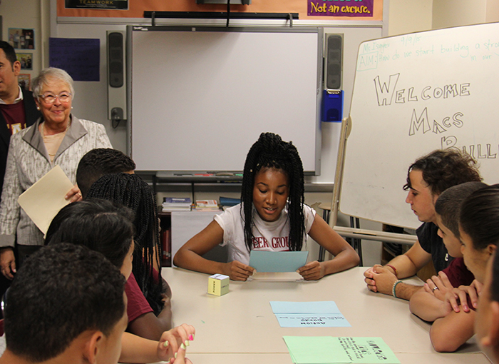 SAT and AP test scores were up this year for New York City public high school students, Schools Chancellor Carmen Fariña said on Wednesday. Shown above: Fariña visits a high school class. Photo courtesy of the NYC Department of Education