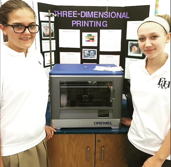 Students from Fontbonne Hall Academy are helping girls from Visitation Academy become acquainted with STEM. Photo courtesy of Fontbonne Hall Academy