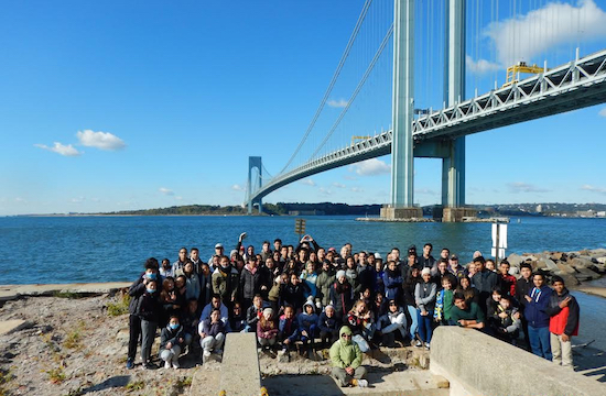 The Friends of Denyse Wharf relax after completing their cleanup of the old wharf at the foot of the Verrazano-Narrows Bridge. Photo courtesy Friends of Denyse Wharf