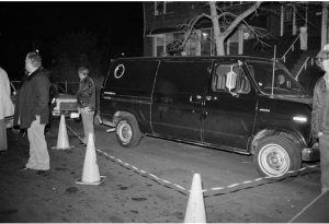 In this Dec. 13, 1978 file photo, police cordon off an area around a stolen black van discovered Brooklyn. Police suspect the van was used by thieves who escaped with more than $6 million in cash and jewels from a John F. Kennedy International Airport hangar. Vincent Asaro is on trial for his part in the heist that was immortalized in the Martin Scorsese film "Goodfellas." AP Photo/Ken Murray, File