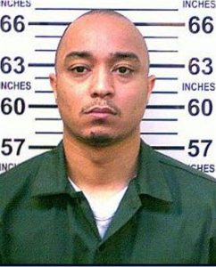 This 2014 photo provided by the New York Department of Corrections shows Tyrone Howard who is in police custody as the suspect in the killing of NYPD Officer Randolph Holder, who was shot dead Tuesday night in East Harlem. Howard, in police custody Wednesday, had been arrested 20 times for offenses ranging from drug possession to robbery, had been sentenced to state prison twice since 2007 on separate drug possession and sale convictions, state records show. New York Department of Corrections via AP