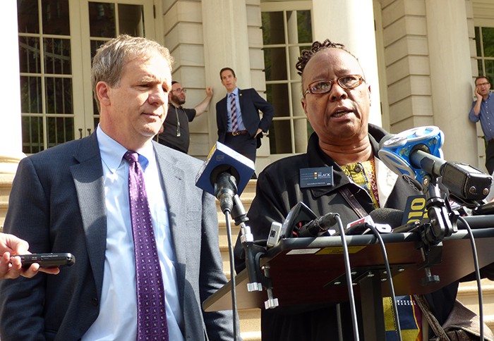 Bill Easton, with the Alliance for Quality Education, and Bertha Lewis, president of the Black Institute, called Moskowitz’s announcement a “non-announcement.” Photo by Mary Frost
