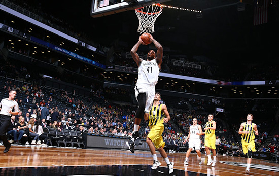 Power forward Thomas Robinson soars in for two of his 12 points during Brooklyn’s exhibition loss to Turkey’s Fenerbahce Ulker at the Barclays Center on Monday night.